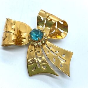 Vintage Goldtone Blue Rhinestone Bow Cut Out Brooch